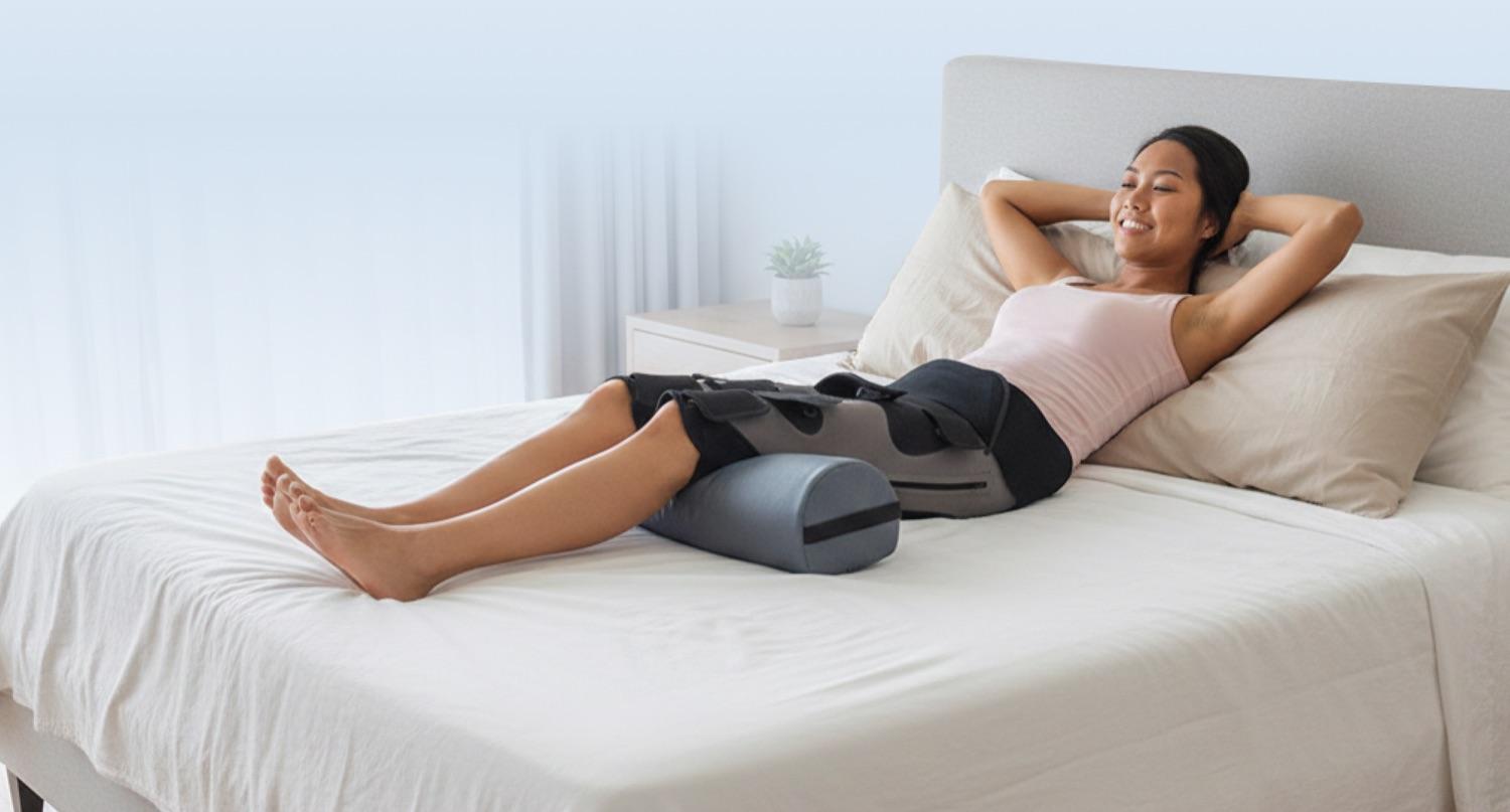 Woman relaxing while using wearable therapy device